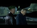 Putin inspects helicopters and missiles in visit to military base