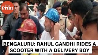 Congress leader Rahul Gandhi rides pillion on delivery boy’s scooter to reach Bengaluru hotel