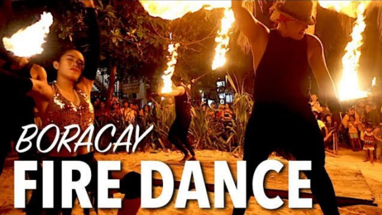 Catch a glimpse of evening fire show at Boracay beachfront.