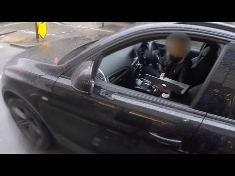 Woman on Laptop While Driving