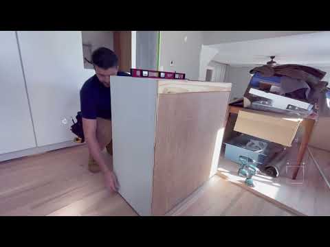 kitchen island installation. Anchoring and Wrapping a Kitchen Island.