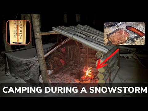 Solo Overnight Improving the Poachers Camp During a Snowstorm and Cooking Meat on a Rock