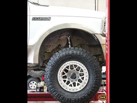 35\" Nitto Tires and KMC KM235 Bead Lock wheel install on a 2005 Ford Excursion | #wheelwednesday