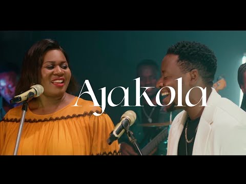 AJAKOLA  - BENJAMIN KAGGWA Ft JUSTINE NABBOSA  [ Official ]