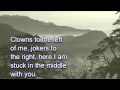 Stealers Wheel ~ Stuck In The Middle With You [LYRICS]
