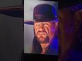 The undertaker rolls eyes back at the audience…