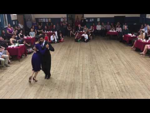  Amanda Costa  and  Adrian Costa  are  dancing  to  "  Mozo Guapo  "  by  Ricardo Tanturi