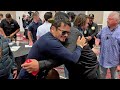 MARCOS MAIDANA EMBRACES EDDY REYNOSO AS THE TWO SHOW RESPECT AS THEY MEET IN LAS VEGAS