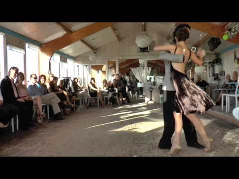  Damian Rosenthal  and  Vanessa Fatauros  are  dancing  to  "  La Cicatriz  "  by  Juan D'Arienzo