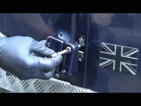 2011 Defender door hinge replacement.