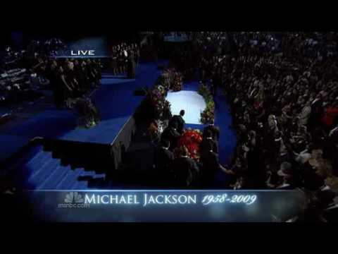 A gospel choir sings " Soon and Very Soon " at the memorial service for Michael Jackson