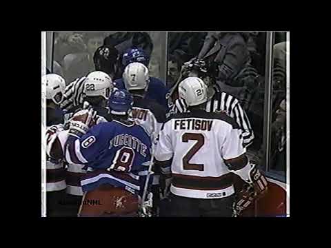 Slava Fetisov tries to fight Joe Kocur after he hit him with an elbow (1993)