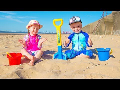 Gaby and Alex on the Beach playing Sand and other Kids Toys