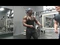 Muscle God squatting a person and chest bouncing