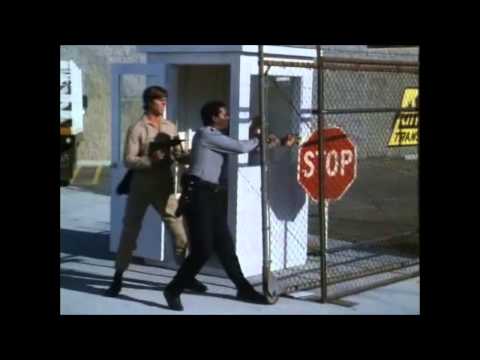 Security Officer Taken Hostage and Knocked Out (Off Screen)