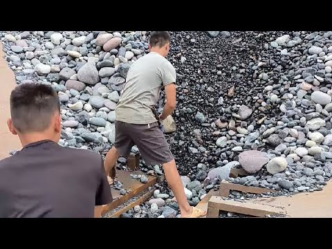 Barge unloading river rock and crushed coal - Relaxing video, great flow sound