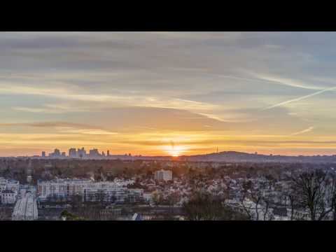 Timelapse HDR - Sunrise over Paris La Défense from Saint Germain en Laye