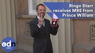 Ringo Starr receives MBE from Prince William