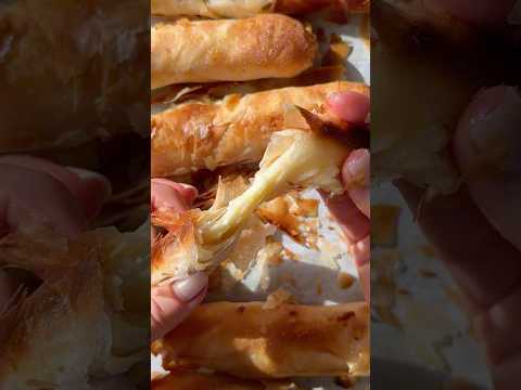 Flaky, buttery layers filled with melty cheese—this Borek will have you hooked! #recipe