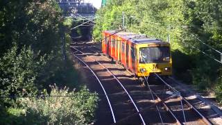 preview picture of video 'Tyne and Wear Metro-Metrocars 4064 and 4086 passing Bridge 1126 (Shiremoor)'