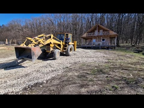 I leveled the road with the bulldozer-excavator at the little house in the woods!