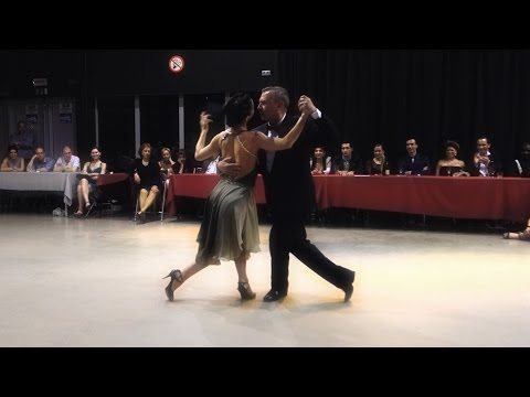  Silvia Lezcano  and  Orlando “Coco” Dias  are  dancing  to  the  milonga  "  Comme Il Faut  "  or  "  Milonga Del Corazon  "  by  Ricardo Tanturi  or  Juan D'Arienzo  at  Antwerpen Tango Festival  in  2015