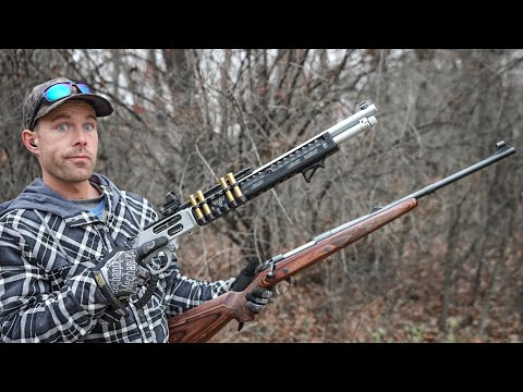 Elephant Rifle vs T-REX Rifle... HUGE Guns For Self Defense?!