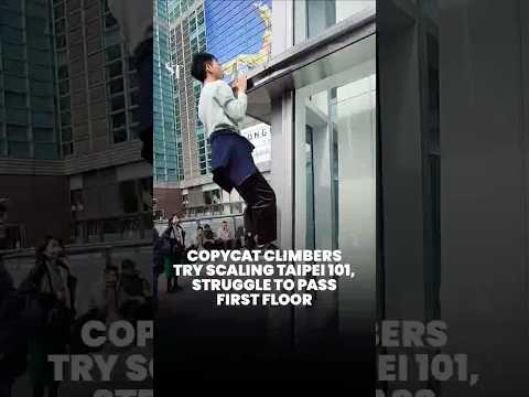 Copycat climbers try scaling Taipei 101, struggle to pass first floor