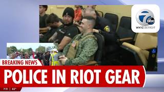 Demonstrators clash outside Dearborn meeting with controversial activist