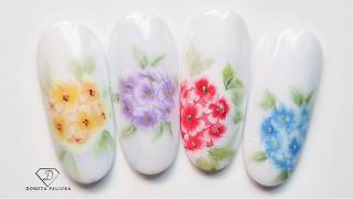 Get spring ready with this simple one stroke flowers nail art. 