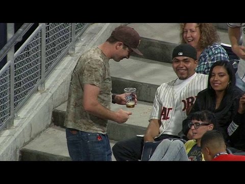 ARI@SD: Fan takes a foul in the stomach, spills beer