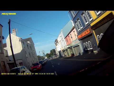 Two Cars do Doughnuts around a mini Roundabout in Bangor County Down