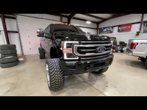 2021 f250 with McGaughys 8” lift 26” forces and 38” amp mt