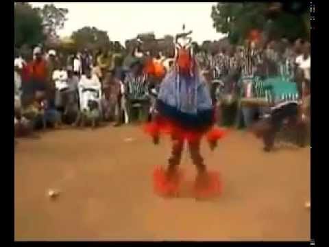 A dancing man on a stick - amazing african tribal dance - Zaouli Dance