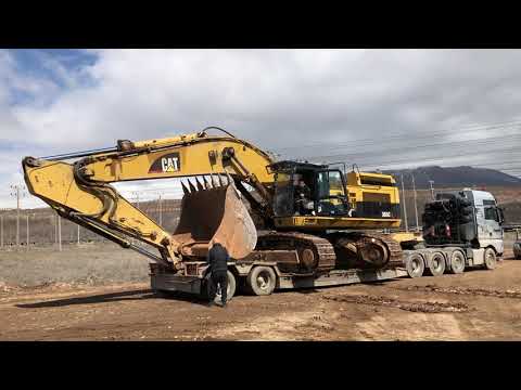 Loading And Transporting By Side The Caterpillar 365C - Fasoulas Heavy Transports