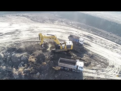 Caterpillar 6015B Excavator Loading Trucks  Aerial Film - Sotiriadis Brothers