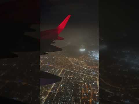 Beautiful city view at night from Wizzair airplane window