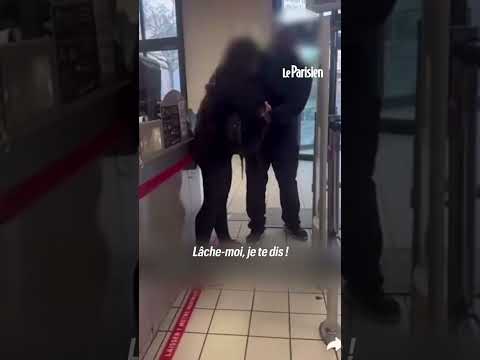 A Carrefour security guard assaults a customer suspected of theft