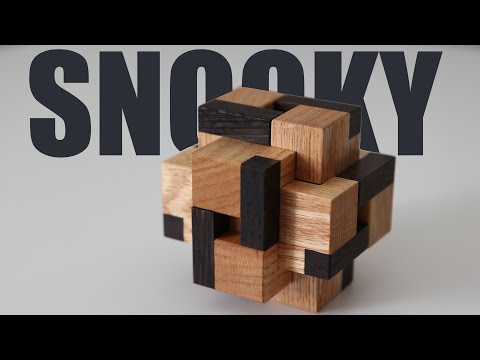 10 moves to remove the first piece of this burr puzzle - How to solve Snooky by Stephan Baumegger