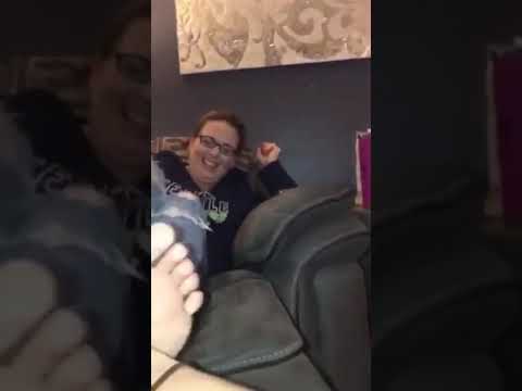 Daughter tickling moms soles