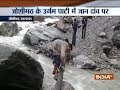 Uttarakhand: People risk their life while crossing a river at Joshimath (watch video)