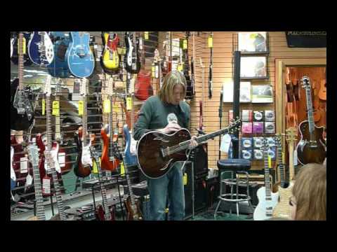 Marc Seal shows off the Taylor T5 at Caruso Music p5