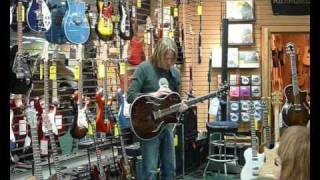 Marc Seal shows off the Taylor T5 at Caruso Music p5