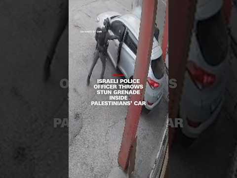 Israeli police officer throws stun grenade inside Palestinians’ car