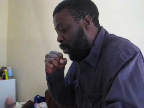 Jacob Makalla a.k.a JCB at his crib rhyming.