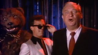 Rodney Dangerfield in Billy Joel’s “Tell Her About It”