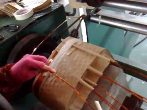 Automatic transformer coil winding machine for transformer r...