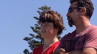 Boy seconds from drowning saved by human chain