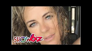 Elizabeth Hurley, 52, shares red hot throwback in shrunken bikini