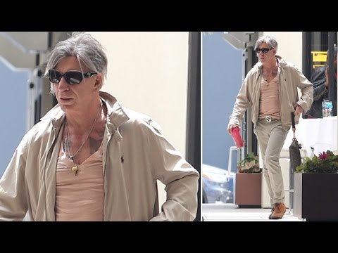 Mickey Rourke Goes Bling In Beige With All His Favorite Brands